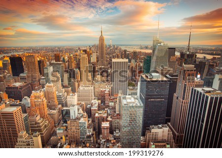 Sunset aerial view of New York City looking over midtown Manhattan towards downtown.