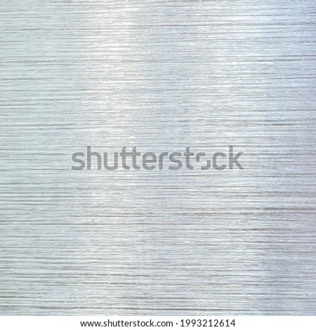 Tightly stretched plastic wrap texture, background, reflections of daylight
