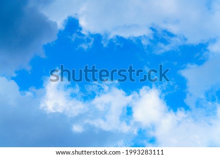 white clouds on a background of blue sky, cloud formations in the sky.