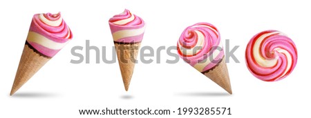Pink and yellow ice cream in waffles cone on a white isolated background. toning. selective focus Royalty-Free Stock Photo #1993285571