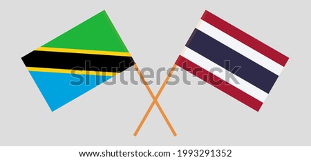 Crossed flags of Tanzania and Thailand. Official colors. Correct proportion