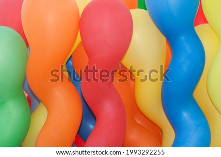 Colorful oblong balloons at the festival .Background of colorful balloons.