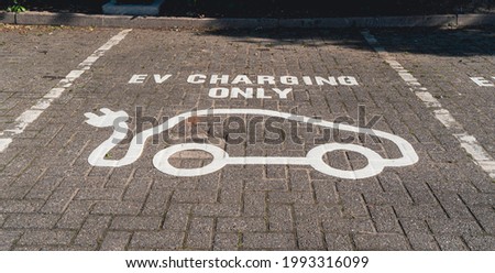 EV Charging parking space painted on car park surface