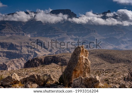 Clouds Hang Low On The Mexican Boarder in Big Bend from the Marufo vega trail Royalty-Free Stock Photo #1993316204