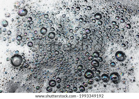 Bubbles background in a water bowl. Beautiful abstract picture