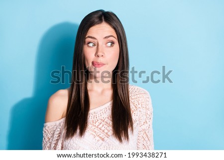 Photo of hungry excited young woman look empty space imagine yummy food isolated on blue color background Royalty-Free Stock Photo #1993438271