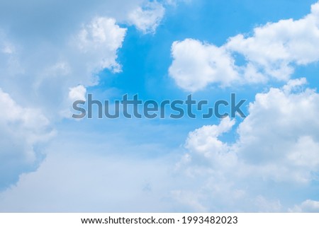 Summer Blue Sky and white cloud white background. Beautiful clear cloudy in sunlight spring season. Panoramic vivid cyan cloudscape in nature environment. Outdoor horizon skyline with spring sunshine