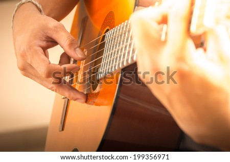 Man playing guitar , close up Royalty-Free Stock Photo #199356971