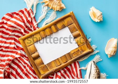 summer background from photo frame, seashells