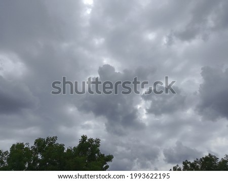 beautiful sky in amazing rainy day and dark clouds looks very beautiful with sun rays comming through it
