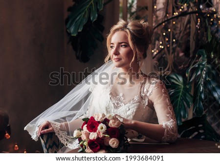 portrait of the bride with a bouquet