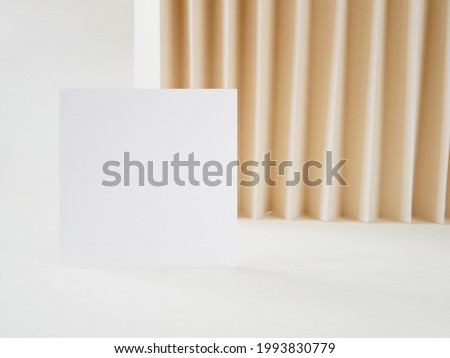 Blank paper card mockup on neutral beige geometric background for presentation personal and corporate identity, artwork and stationery design