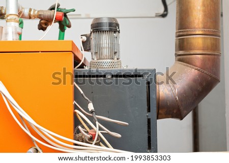 Picture of an automatic pellet burner system
