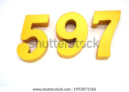    Arabic numerals 597 gold on white background                                                  