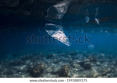 Underwater ocean with plastic bag, ecological problem in World ocean