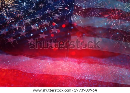 American flag with glitter bokeh background and fireworks