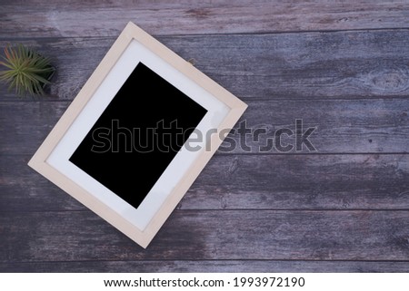 Blank photo frame on Table.
