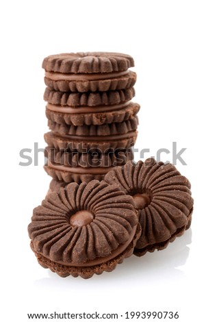 stack of chocolate swirl cookies on white background