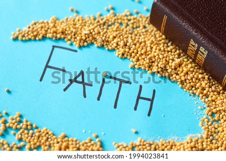 Strong faith like a mustard seed in God Jesus Christ. Parable of hope and trust. Golden Holy Bible with handwritten word text. The gospel of Matthew 17:20. Faithful Christian concept. Royalty-Free Stock Photo #1994023841