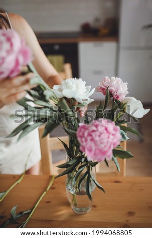 Bouquet of white and pink peonies