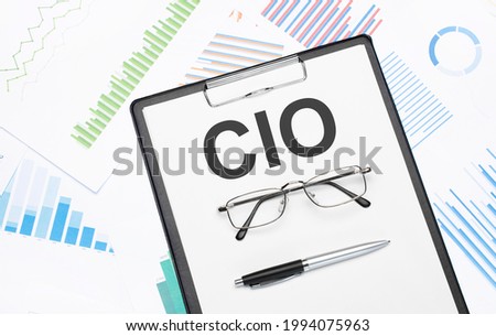 cio sign. Conceptual background with chart ,papers, pen and glasses