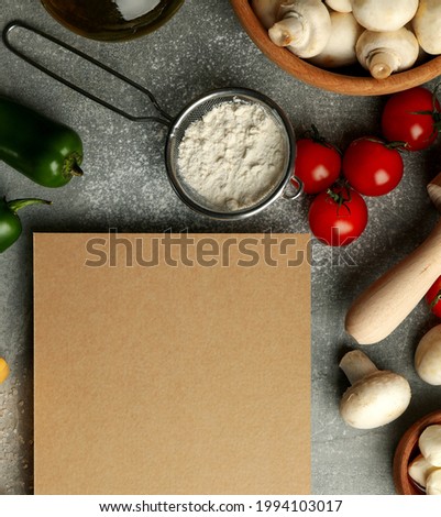 Ingredients for cooking and space for text on gray background