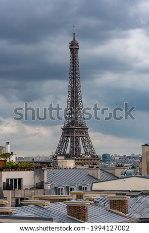Paris, the Eiffel Tower, beautiful monument, and typical roofs