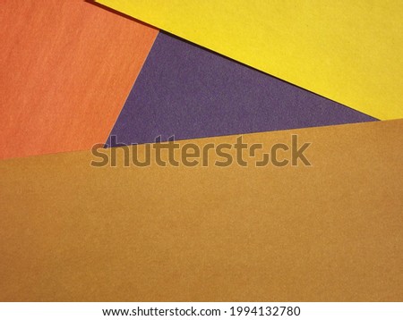 yellow, green, red, burgundy, blue, orange geometric shapes as background. High quality photo