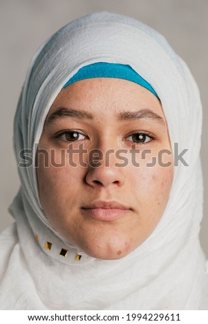 Young cheerful Muslim woman portrait Royalty-Free Stock Photo #1994229611