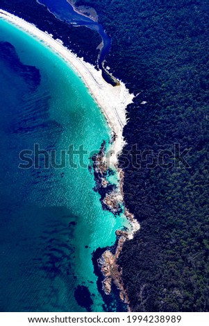 Freycinet coastline Tasmania from the air. Shows the different patterns in the water.