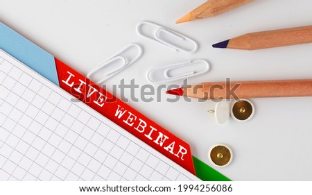 LIVE WEBINAR text on the folder register with office tools