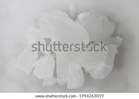 Paraffin wax. Paraffin wax in industry. Paraffin wax is a colorless or white soft solid derived from petroleum, coal, and oil shale. Royalty-Free Stock Photo #1994263019