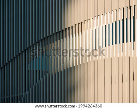 Metal pattern Architecture detail Modern building facade shade lighting Royalty-Free Stock Photo #1994264360
