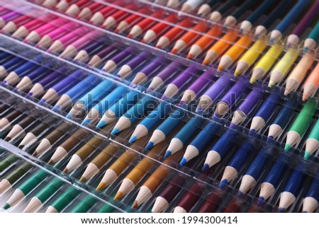 Set of multi-colored wooden pencils of different colors and shades