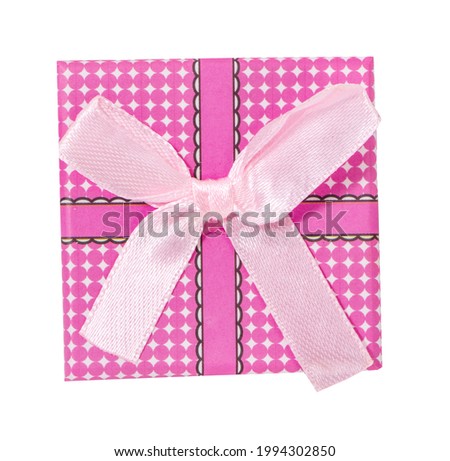 gift box with pink bow and long ribbon isolated on white background.