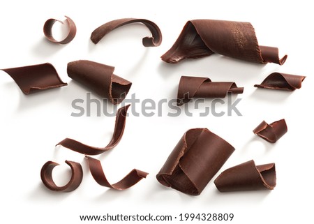                            Chocolate curls set. Isolated on white     Royalty-Free Stock Photo #1994328809