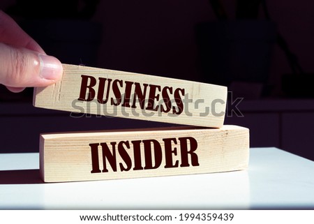 Business insider symbol. Wooden blocks with words 'business insider'. Business insider concept. 