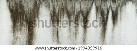 The white cement wall with rain stains. Royalty-Free Stock Photo #1994359916