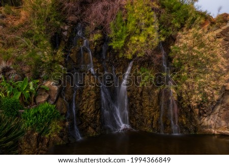 Artificial waterfall in Tekirova, Turkey in a beautiful day in May 2021. Picture taken near famous hotel tekirova. Long exposure shot.