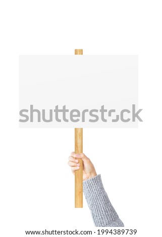 Hand holding wooden sign board isolated on white background.  Protesters people on picket strike. Object with clipping path
