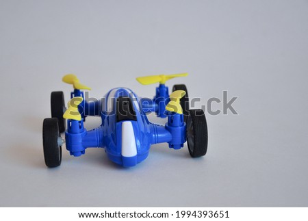 Funny multi-colored toy car Toy car. Children's toy.