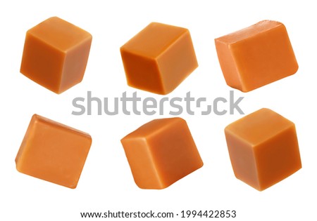 Set with delicious caramel candies on white background. Banner design Royalty-Free Stock Photo #1994422853