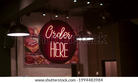 Order here typography sign for coffee shop (Neon sign) 