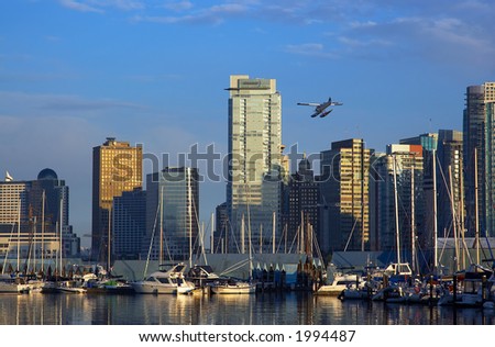 Parking sailboats and a float plane in Vancouver harbor. More with keyword group14g
