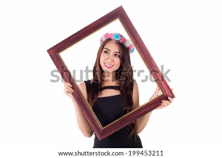 Woman with picture frame on white, Smiling asian women on black dress look to left