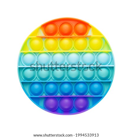 Rainbow popit fidget toy isolated on white background, top view