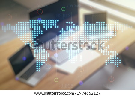 Multi exposure of abstract creative digital world map and modern desktop with laptop on background, research and analytics concept