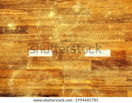 White lines on wooden floor in gymnasium gym hall.  Abstract.