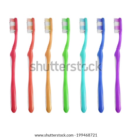 Set of colorful toothbrushes isolated over white Royalty-Free Stock Photo #199468721