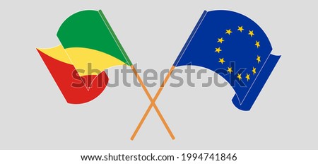 Crossed and waving flags of Republic of the Congo and the European Union